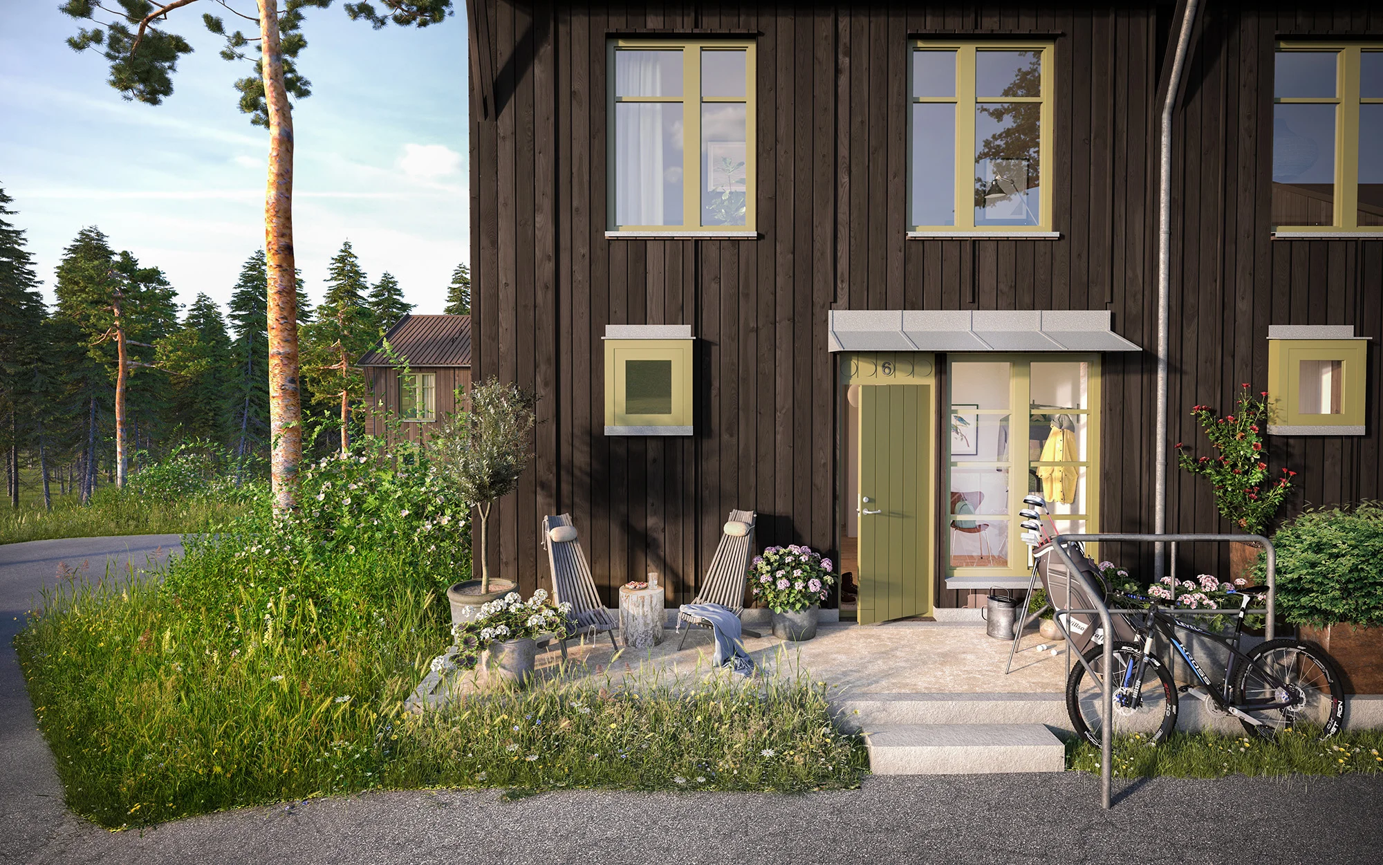 Samma radhus en sommardag med blommande fjällängar.