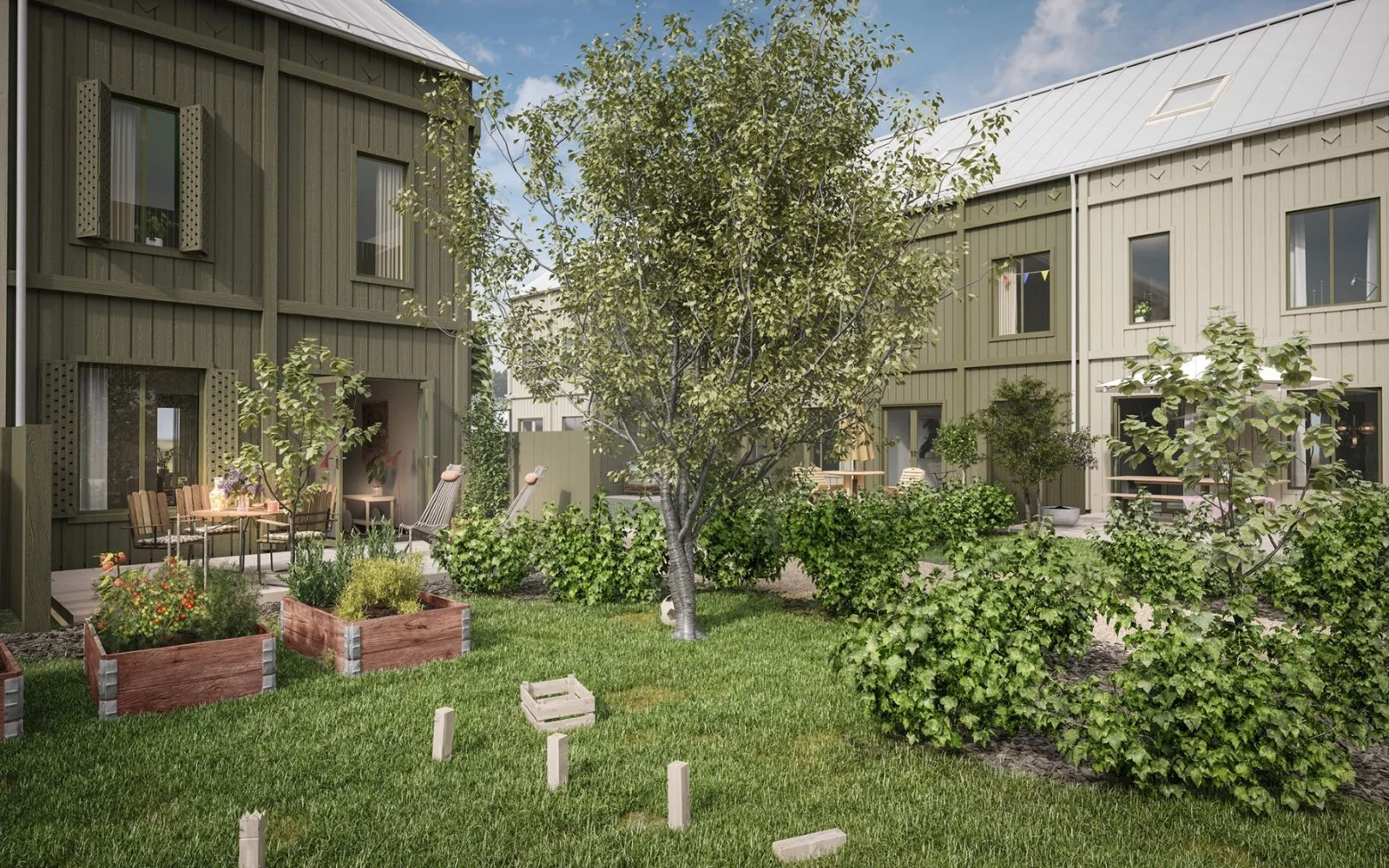 Radhus i grön och beige träpanel med trädgård och odlingslådor.